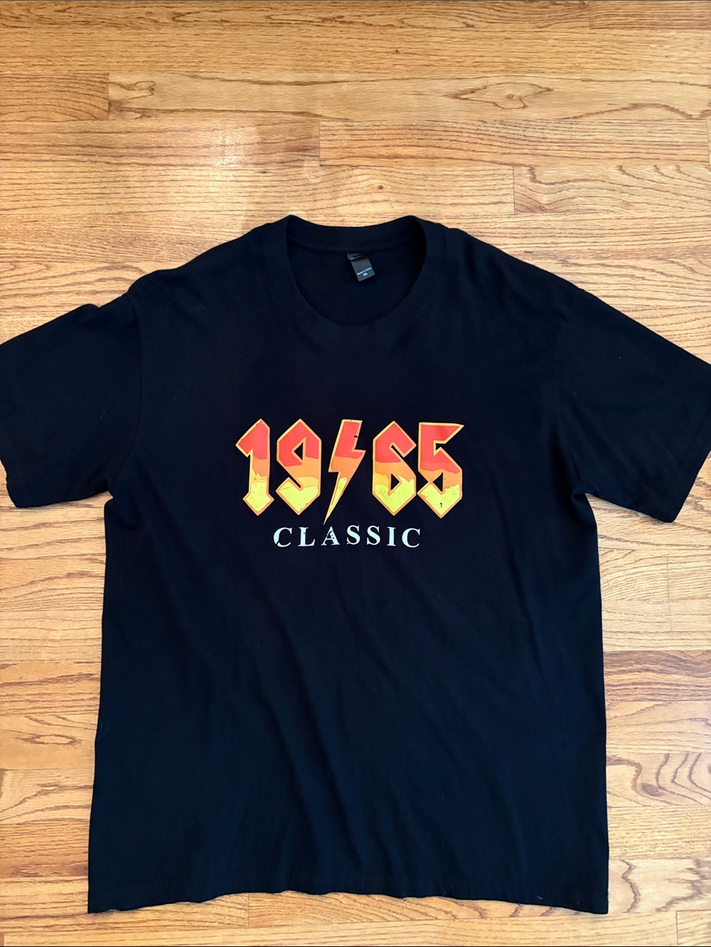 Classic Black Short-Sleeve Tee with Red and Yellow 1955 Graphic